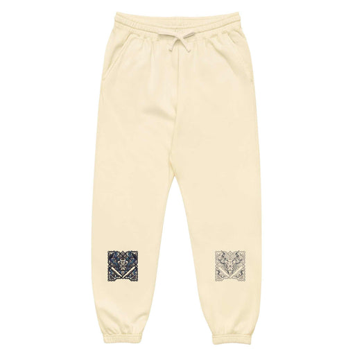 Twin Sigils garment-dyed fleece sweatpants with minimalistic sacred geometry symbols on each leg and relaxed fit.