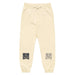 Twin Sigils garment-dyed fleece sweatpants with minimalistic sacred geometry symbols on each leg and relaxed fit.